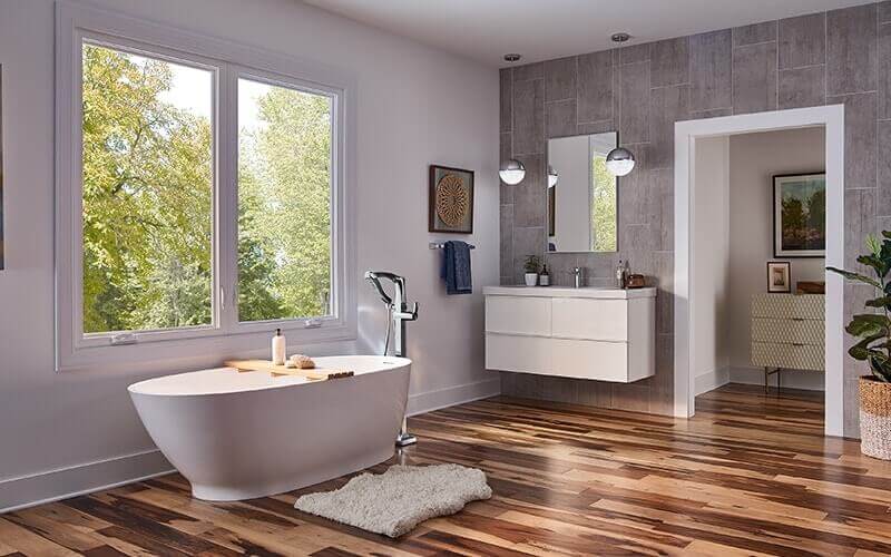 bathroom with modern sink and tub