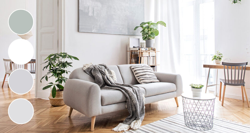 a bright living room in cool neutrals with a gray couch